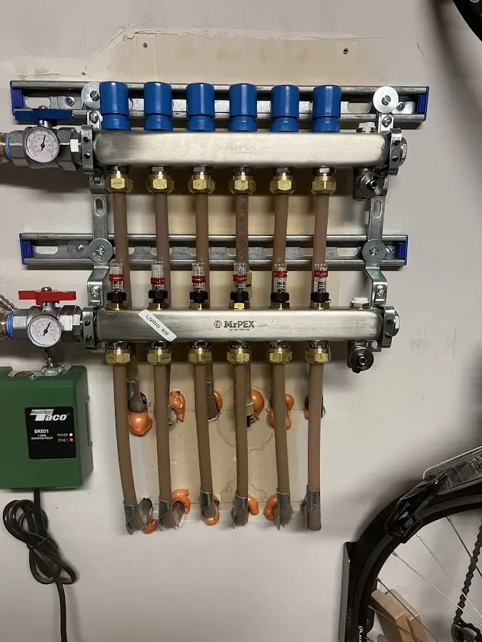 Plumber performing Gas Line Installation at a residential property in Central City